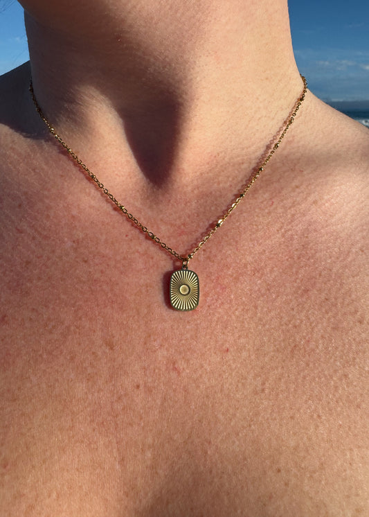 Oval Sunburst Charm