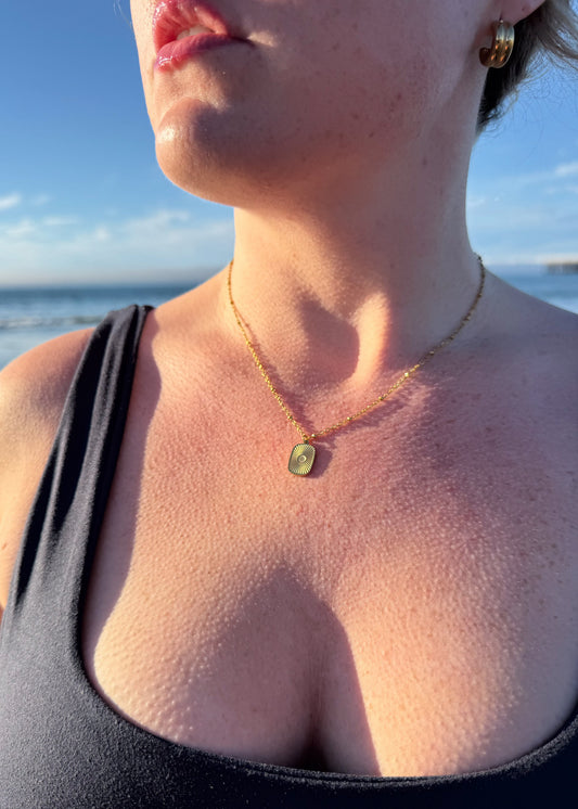 Oval Sunburst Charm